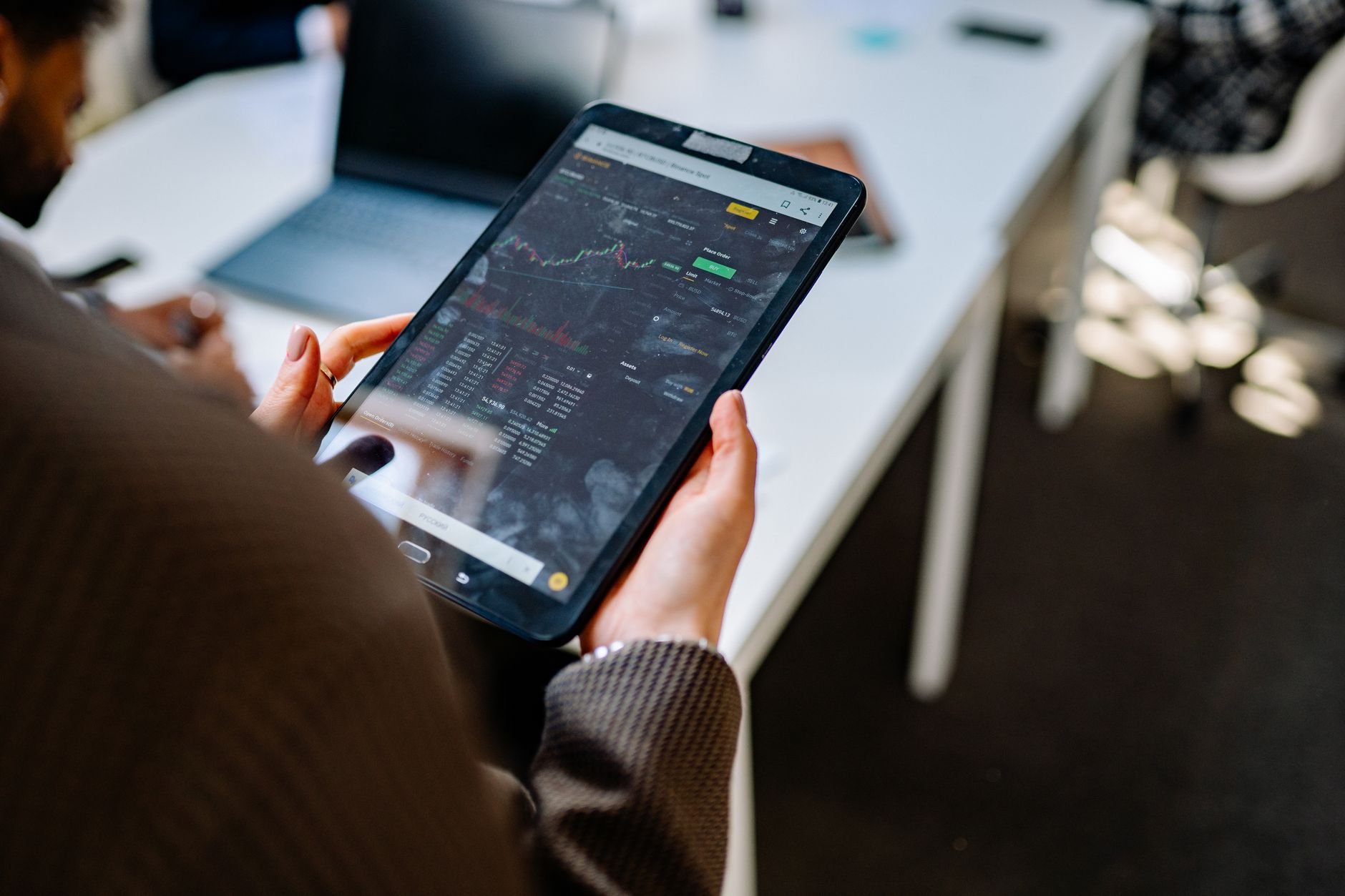 Binance staking interface on a smartphone showing crypto yields