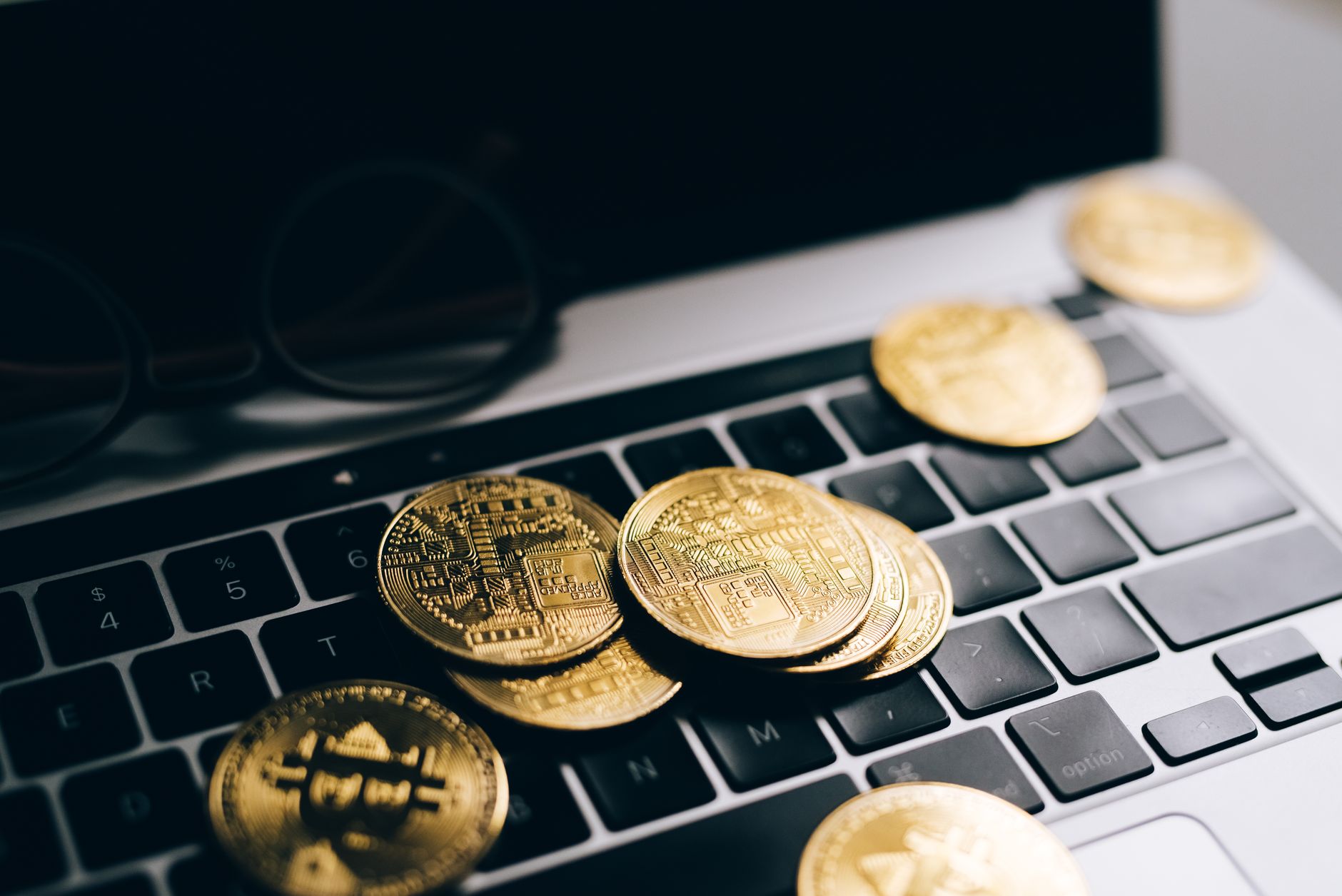 Detailed view of cryptocurrency trading charts on digital screens, showcasing market fluctuations.
