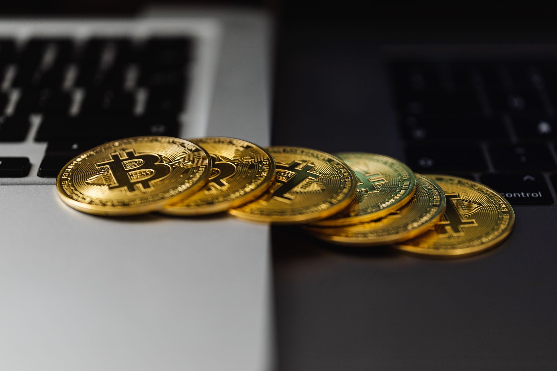 Hardware wallet device with seed phrase card and crypto coins.