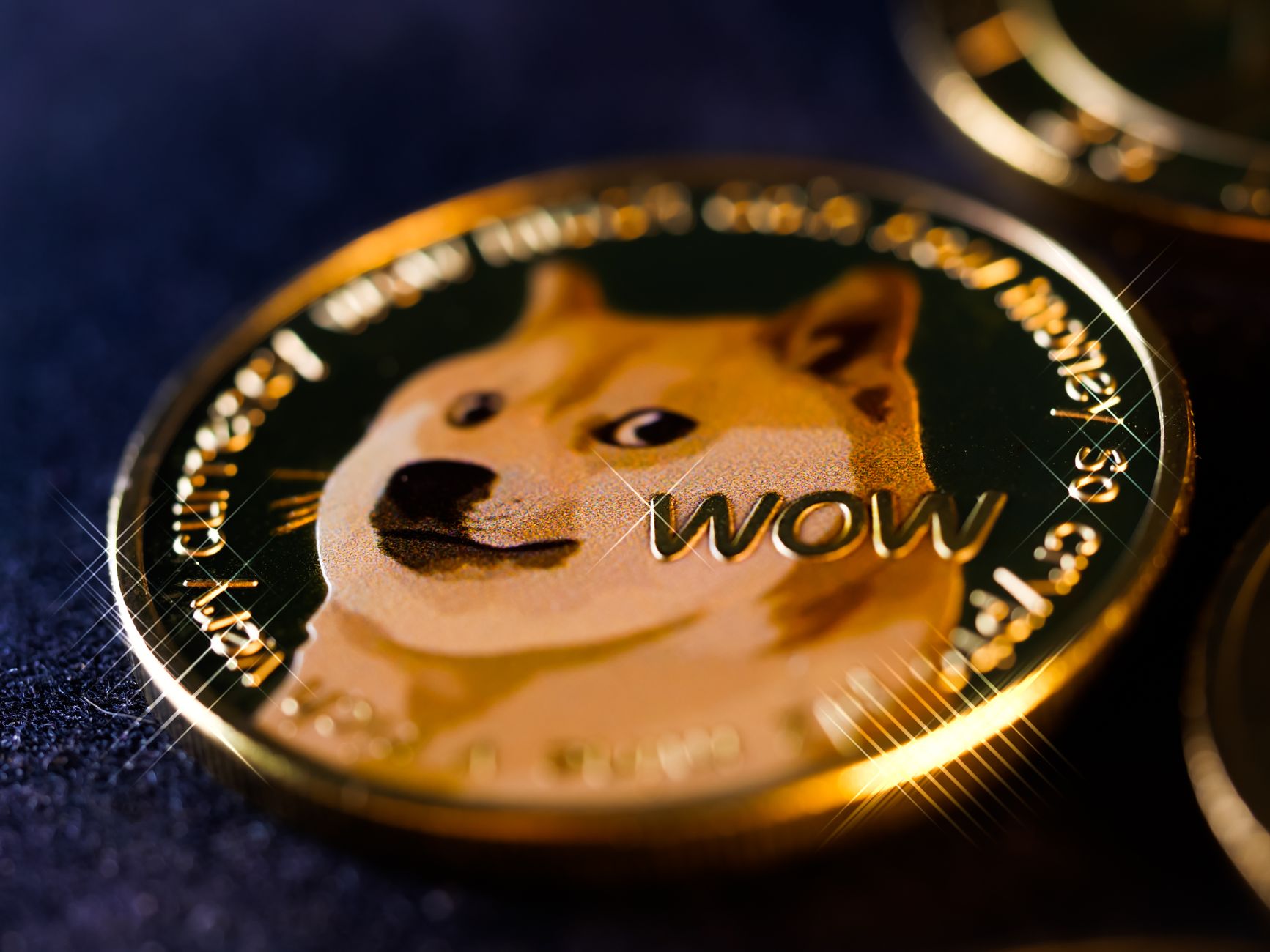 Colorful meme coin tokens with a warning sign on a trading screen.