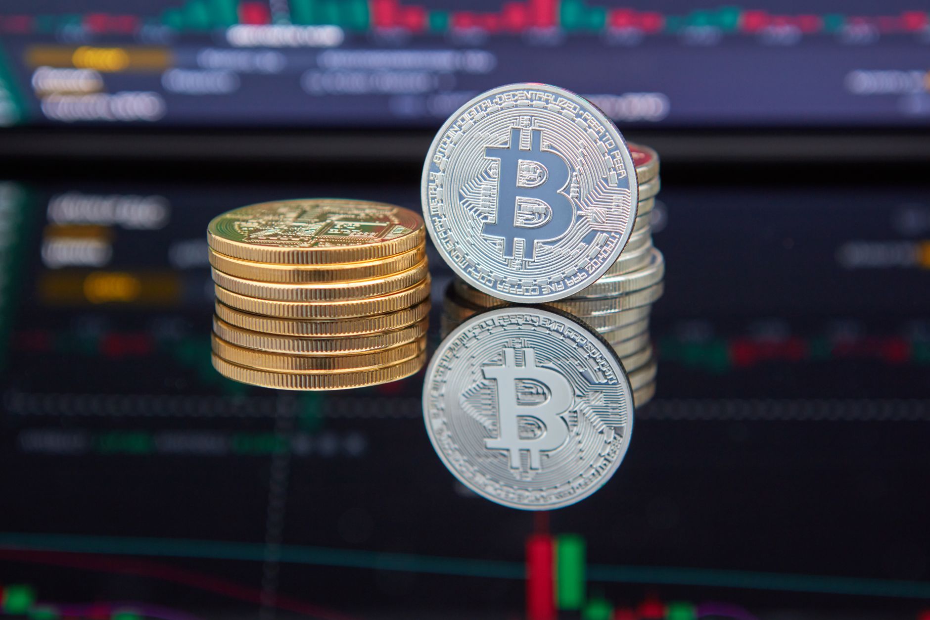 Bitcoin ETF fund management concept with gold coins and charts.