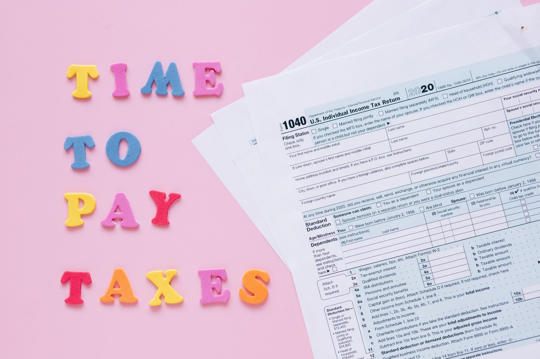 IRS tax forms and filing documents on a desk