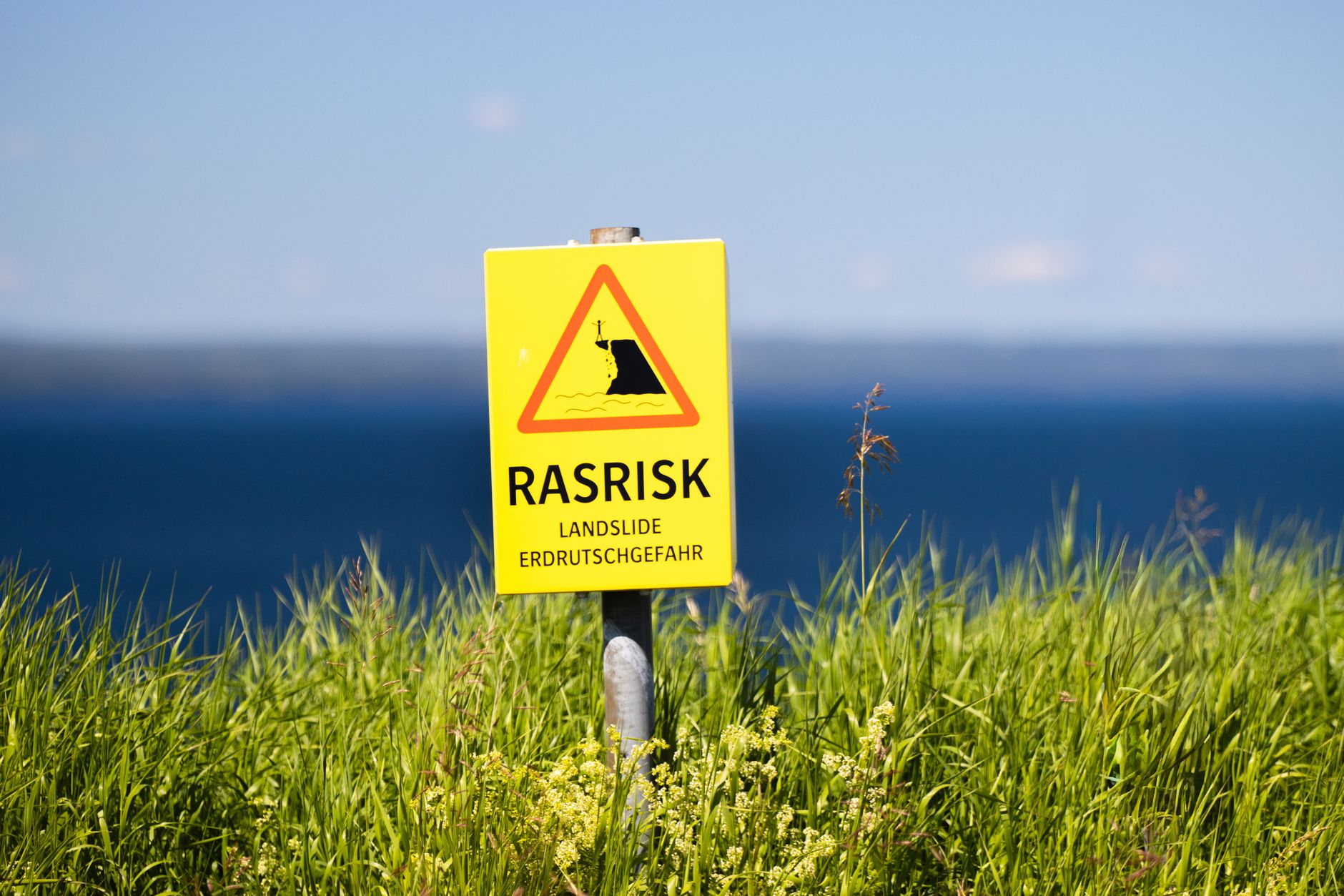 Warning sign symbolizing the high risks of meme coin investments